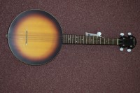 Lot 1521 - An Ozark 5-string banjo, 77cms long, cased.