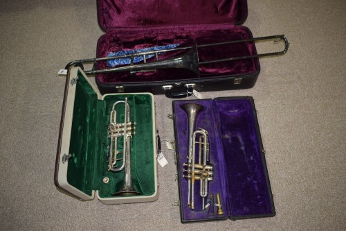Lot 1542 - A plated metal trombone, by Academy, 402; a...