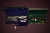 Lot 1550 - A Invicta brass trumpet, cased with mutes;...