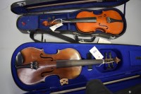 Lot 1570 - Two children's violins, with bows, in cases.