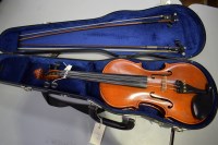 Lot 1571 - A violin, the two piece back 37cms long;...