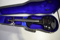 Lot 1572 - An electric violin by Maestro, in solid case.