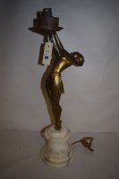 Lot 902 - An Art Deco table lamp in the form of a female...