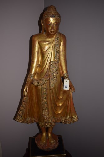 Lot 931 - A 20th Century gilt plaster figure of an Asian...