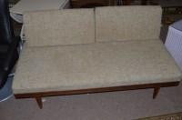 Lot 1115 - A c.1970's two-seater settee, the seat frame...