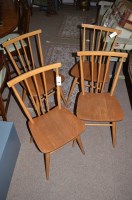 Lot 1156 - A set of four Ercol style beech and elm...