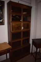 Lot 1200 - An oak Globe Wernicke style sectional bookcase...