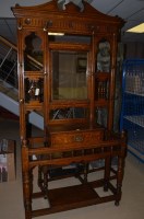 Lot 1223 - A Victorian oak hall stand, the bevelled...