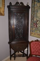 Lot 1227 - A 19th Century carved oak floor standing...