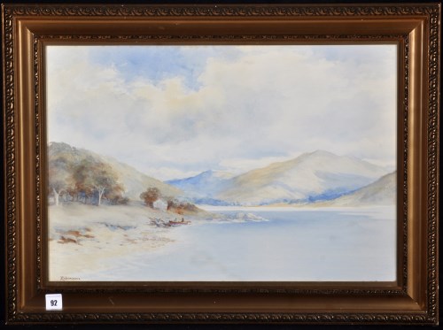 Lot 92 - *** Robertson - a rowing boat on the shore of...