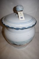 Lot 725 - A large storage jar and cover by Scotland...