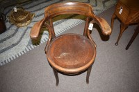 Lot 868 - A Bentwood elbow chair with moulded seat.