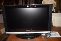 Lot 876 - A Samsung DN1EDVB TV, with remote control,...