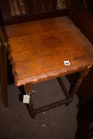 Lot 884 - An oak square occasional table, raised on...