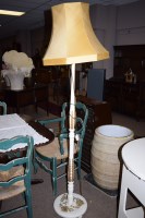 Lot 888 - A white painted standard lamp with gold...