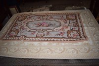 Lot 889 - A modern rectangular machine-made rug by Laura...