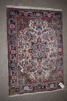 Lot 896 - A small rectangular Persian style rug, with...