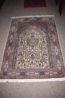 Lot 908 - A 20th Century hand knotted Persian rug with...