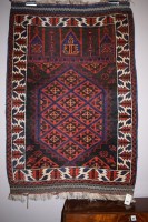 Lot 913 - A modern Persian prayer rug, red blue orange...