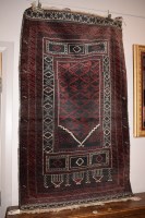 Lot 914 - A 20th Century Persian prayer rug geometric...