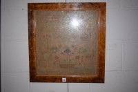 Lot 936 - A framed needlework sampler (badly faded), 51...