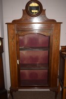 Lot 943 - An Edwardian inlaid mahogany display cabinet,...