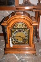 Lot 946 - A 19th Century mantel clock, in arched figured...