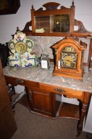 Lot 949 - A Victorian walnut wash stand with marble top...