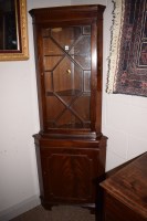 Lot 963 - A reproduction mahogany corner display cabinet.