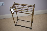 Lot 975 - A late 19th Century brass stick stand with...