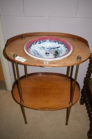 Lot 982 - A 19th Century oval two-tier stained wood wash...