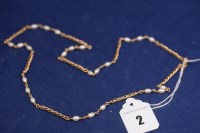 Lot 2 - A 9ct. yellow gold and cultured pearl necklace,...