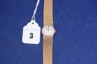 Lot 3 - A 9ct. yellow gold ladies wristwatch, by Omega...