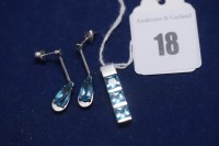 Lot 18 - A topaz pendant and earrings, the pendant set...
