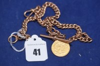 Lot 41 - A 9ct. yellow gold albert watch chain with a...
