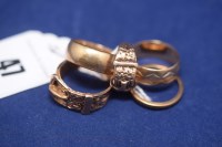 Lot 47 - Three 9ct. yellow gold wedding bands; and two...