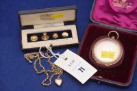Lot 71 - A yellow metal chain and heart pendant,...