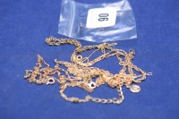 Lot 90 - A yellow metal fine link chain stamped ''750'',...