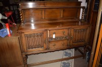 Lot 726 - A mid 20th Century oak sideboard, carved...