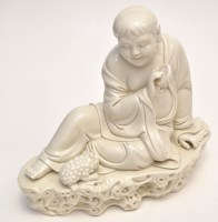 Lot 32 - Chinese 'Dehua' figure of Buddha Maitreya,...