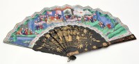 Lot 49 - Chinese black lacquer and paper fan, with...