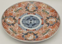 Lot 74 - Large Japanese Imari dish, with central blue...