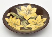 Lot 115 - Moorcroft 'Bermuda Lily' shallow bowl, with...