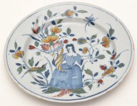 Lot 126 - Polychrome Delft ware dish, with female figure...