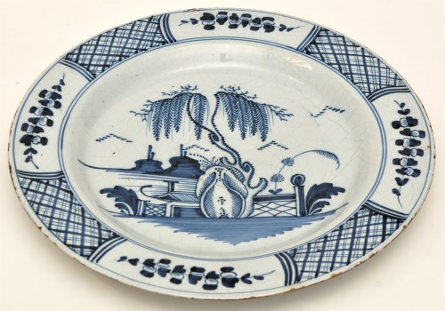 Lot 128 - Delftware blue and white 'chinoiserie' dish,...