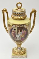Lot 190 - German porcelain yellow ground urn and cover,...