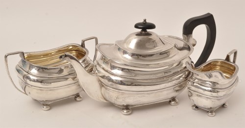 Lot 417 - A George V three-piece silver tea service, by...