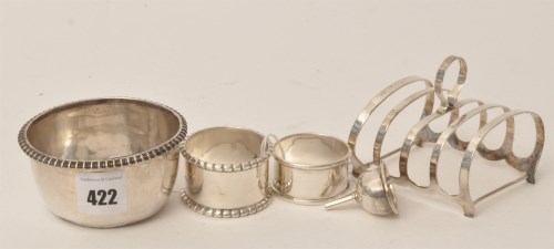 Lot 422 - A George VI silver toast rack, by Charles S....