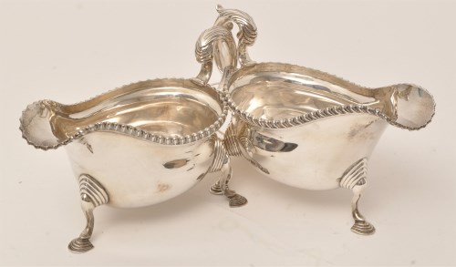 Lot 455 - A pair of George V silver sauce boats, by...