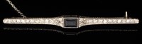 Lot 530 - A sapphire and diamond bar brooch, c.1910, the...